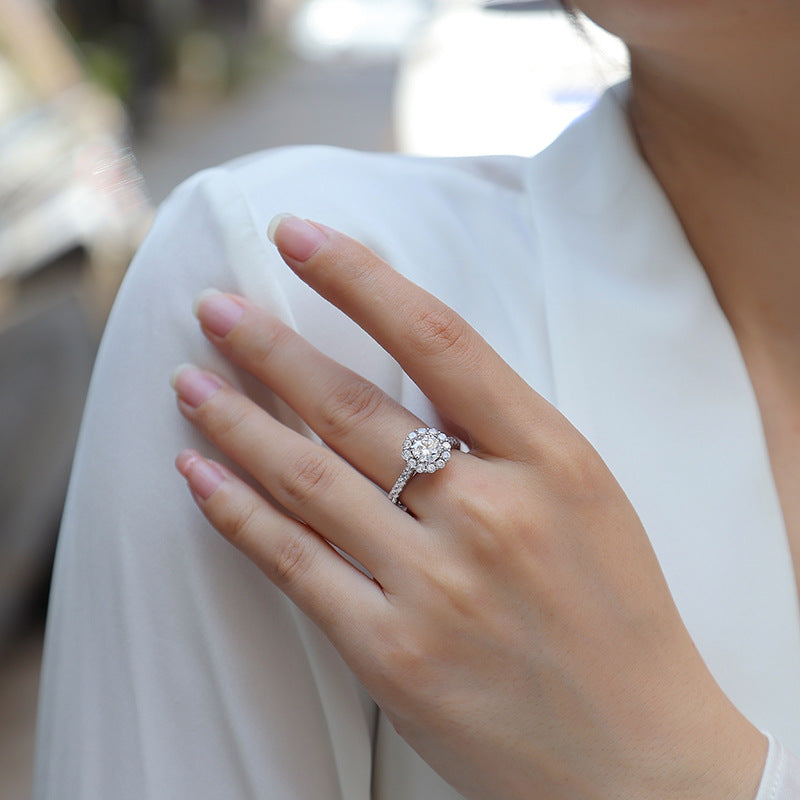 Draycott & Co Elegant Moissanite Halo Ring, worn lifestyle shot
